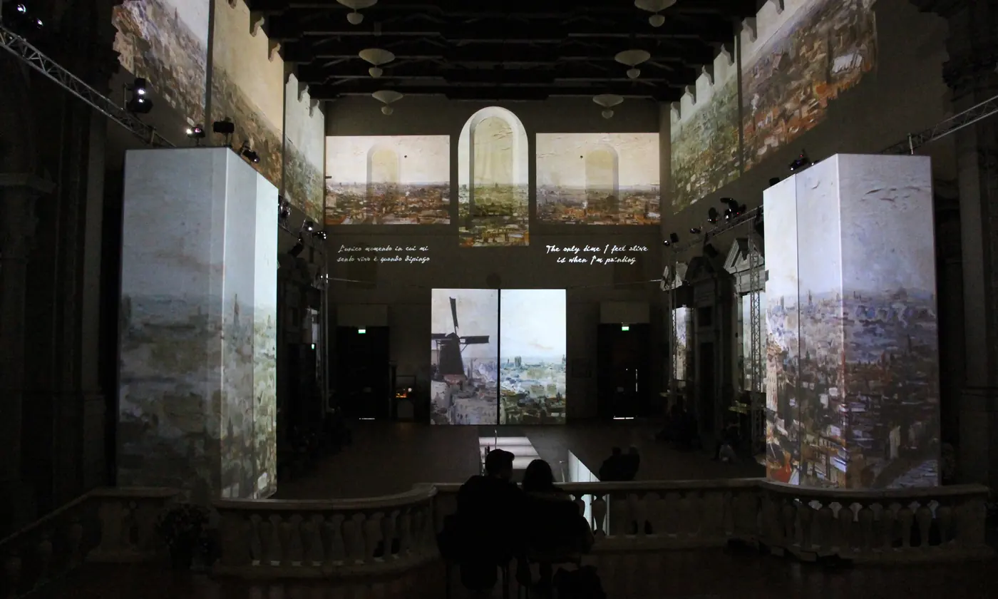 The nave of Santo Stefano al Ponte in 2014, lit by projections of Van Gogh’s paintings on tall panels, not a concert